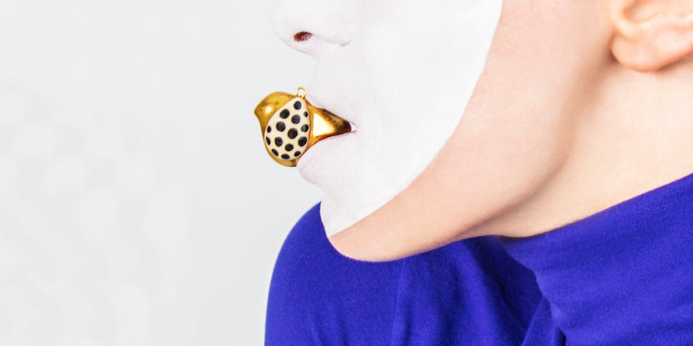 Golden Bird with polka dots necklace pendant