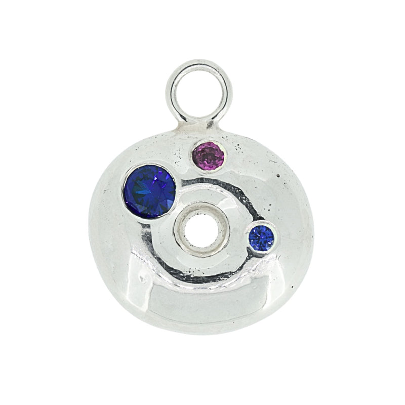 Silver donut necklace with blue sapphire and garnet gemstones on a white background