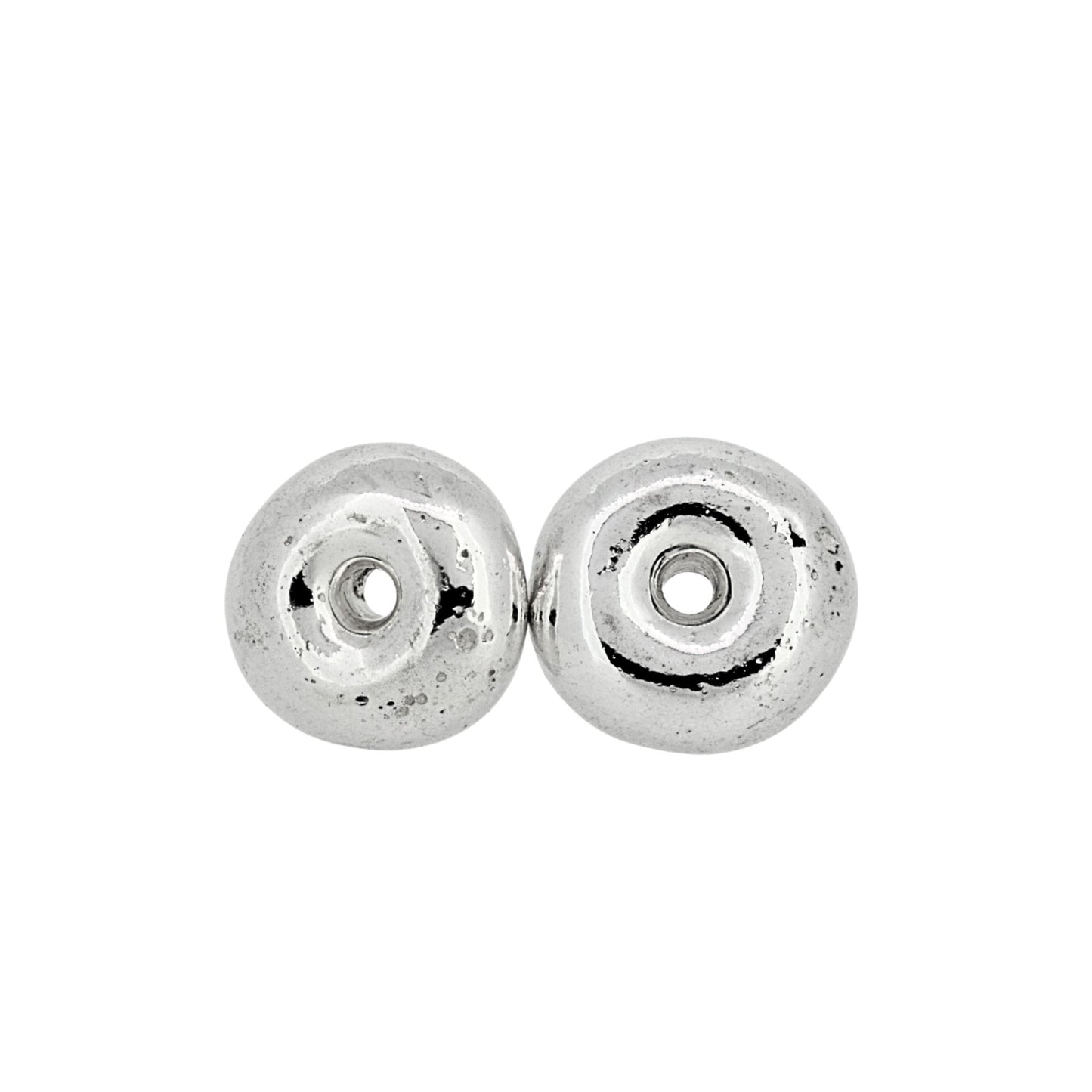 Silver bagel shaped stud earrings on a white background