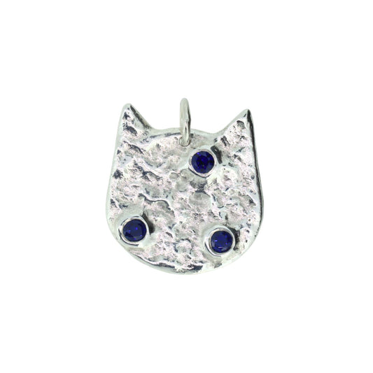 Cat-shaped pendant necklace with blue gemsstones on a white background