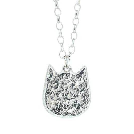 Handcrafted textured silver cat pendant in minimalist style - front